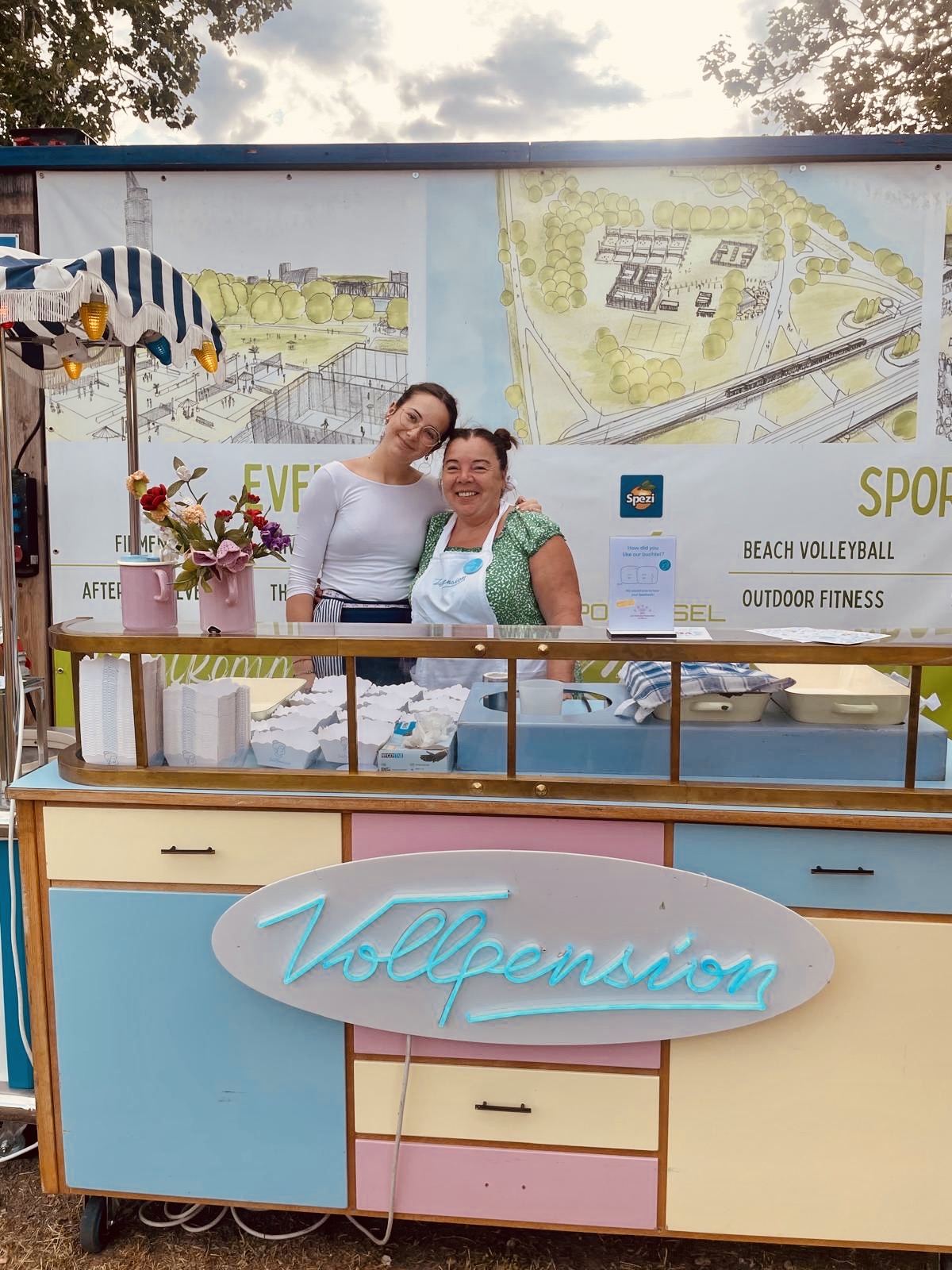 Two generation team of baking grandma and young colleague working at the Buchtelmobil